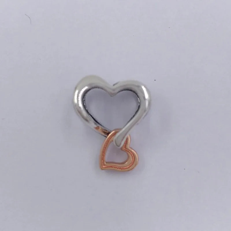 Charm Coração Infinito vazado de dois tons