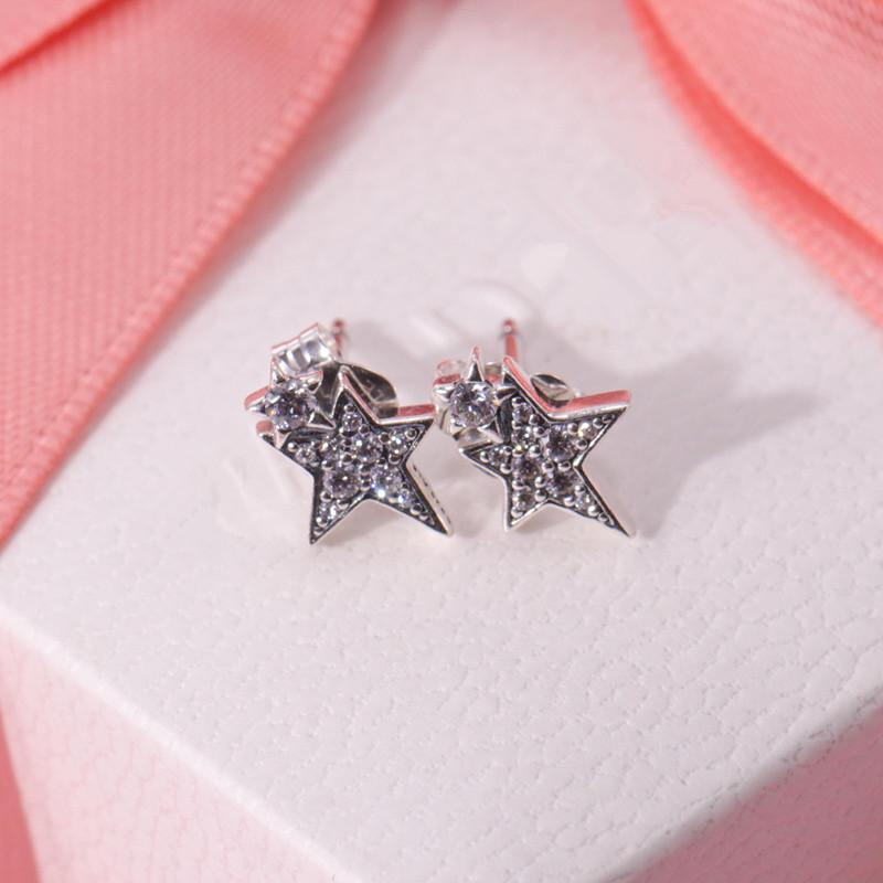 Brincos de Estrelas Assimétricas Cintilantes - Wayne Joias